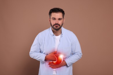 Man suffering from abdominal pain on brown background. Illustration of unhealthy stomach