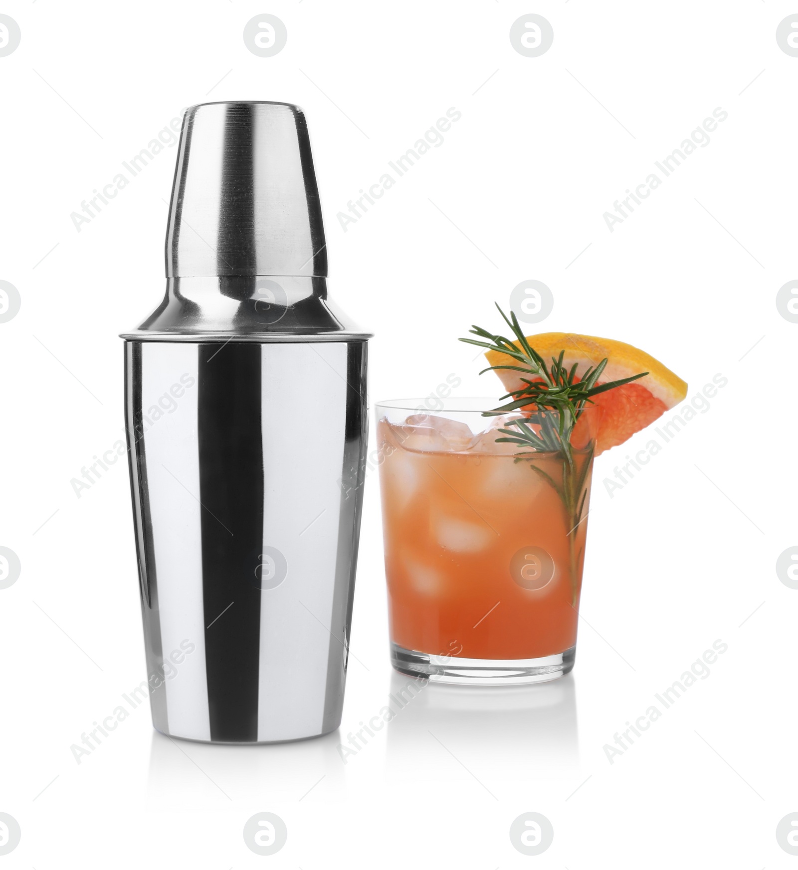 Photo of Metal shaker and delicious cocktail isolated on white