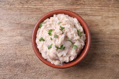Photo of Delicious lard spread on wooden table, top view
