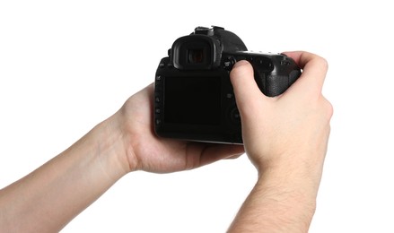 Photo of Photographer holding modern camera on white background, closeup