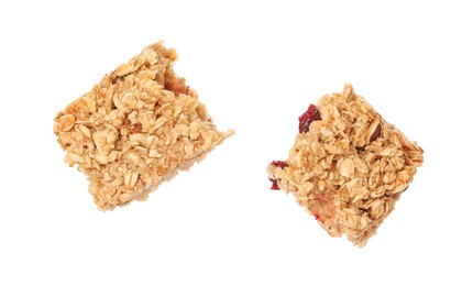 Photo of Pieces of tasty granola bar isolated on white