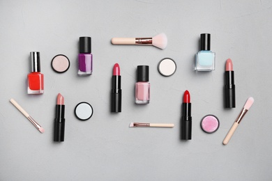 Flat lay composition with cosmetic products on grey background