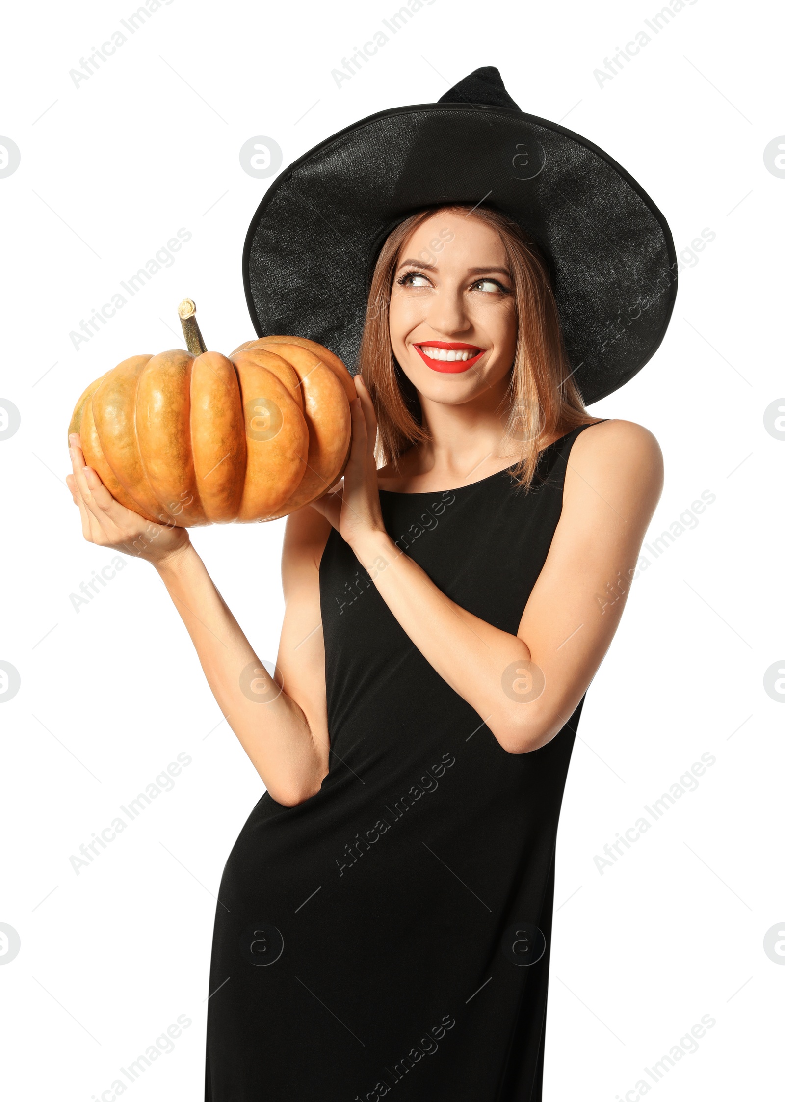 Photo of Beautiful woman wearing witch costume with pumpkin for Halloween party on white background