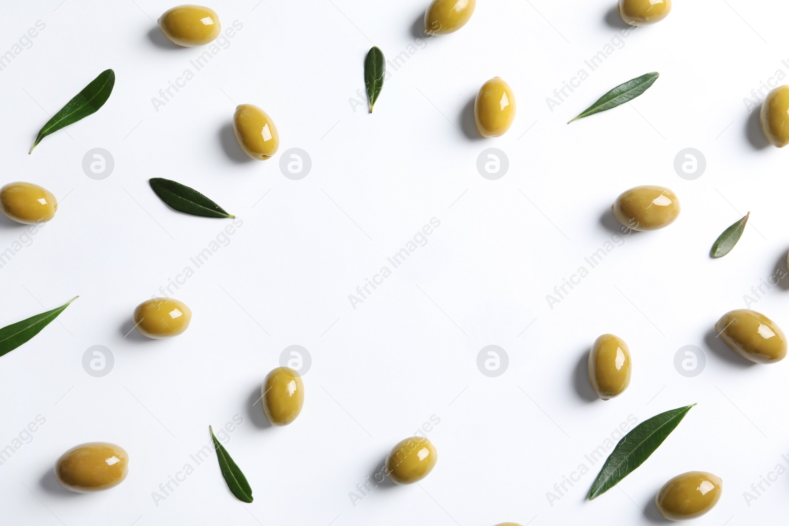 Photo of Flat lay composition with fresh olives covered with oil on white background