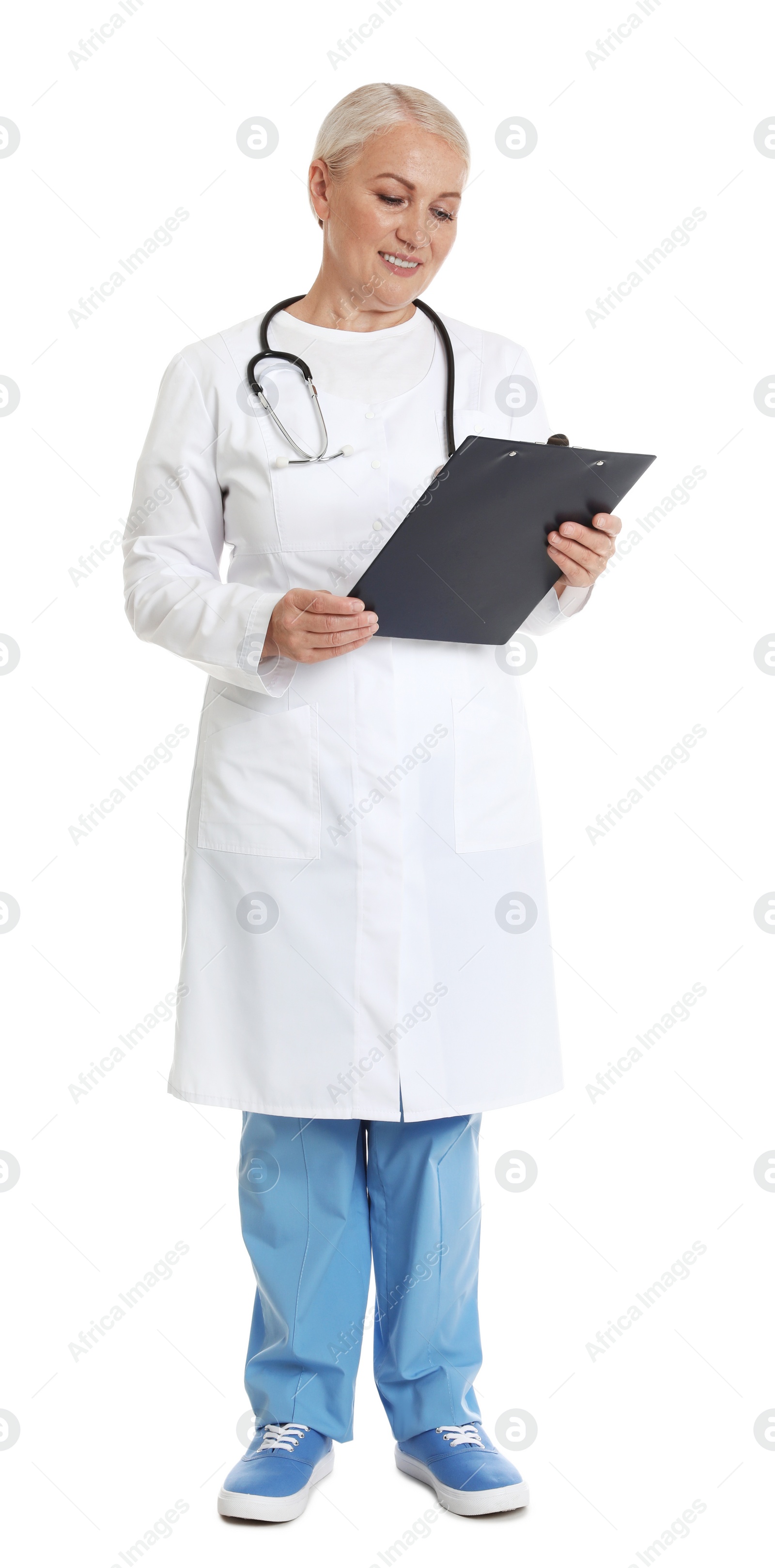 Photo of Full length portrait of female doctor with clipboard isolated on white. Medical staff