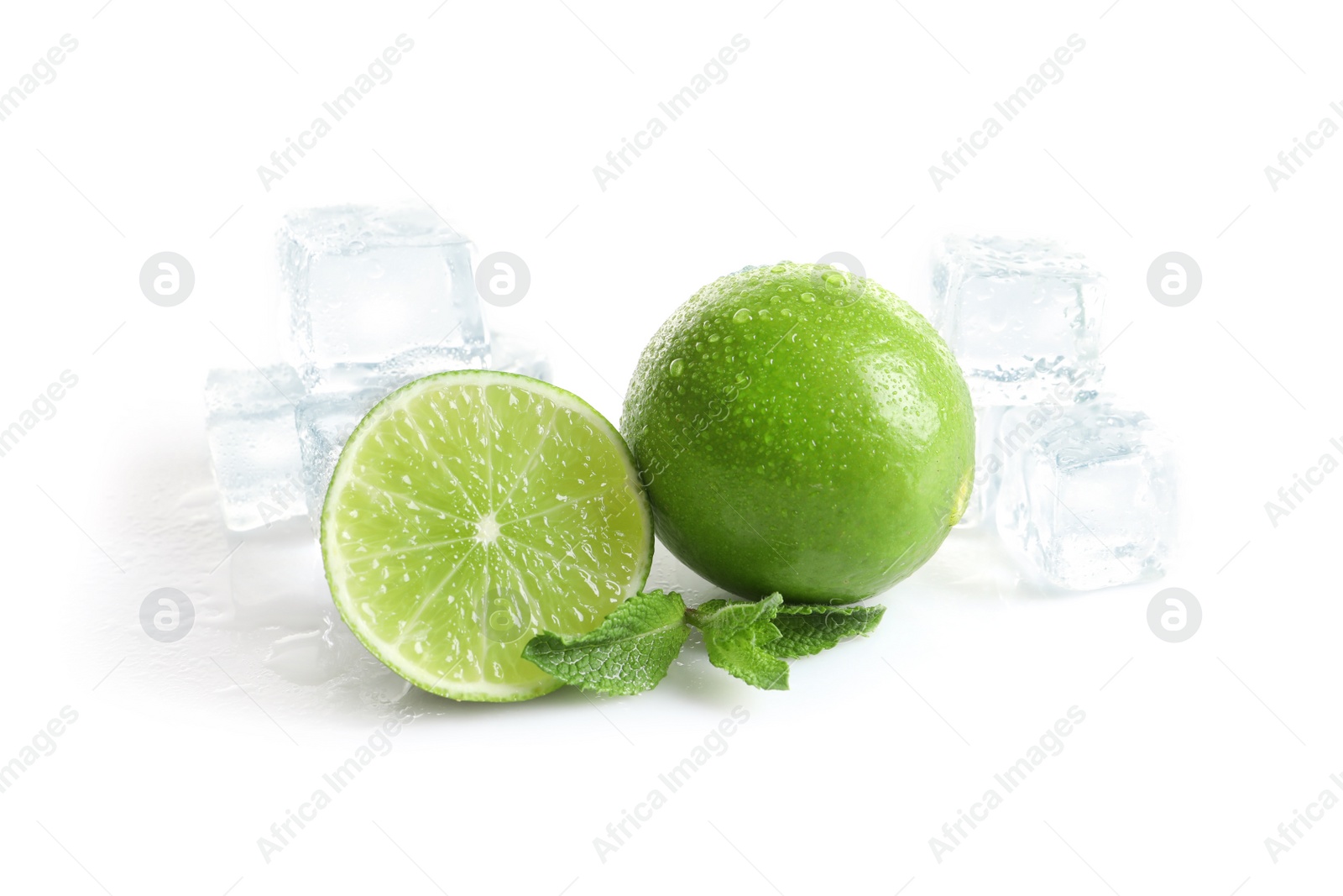 Photo of Fresh ripe limes and ice cubes on white background