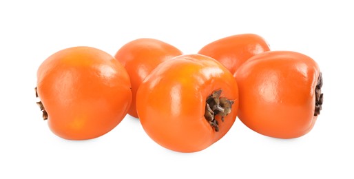 Photo of Delicious ripe juicy persimmons isolated on white