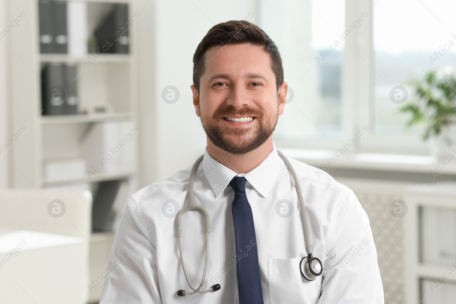 Photo of Portrait of doctor with stethoscope in clinic