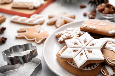 Delicious homemade Christmas cookies on grey table, closeup