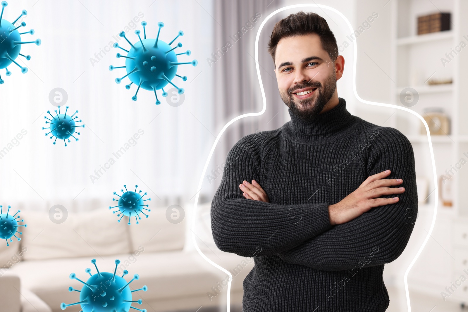 Image of Man with strong immunity surrounded by viruses at home