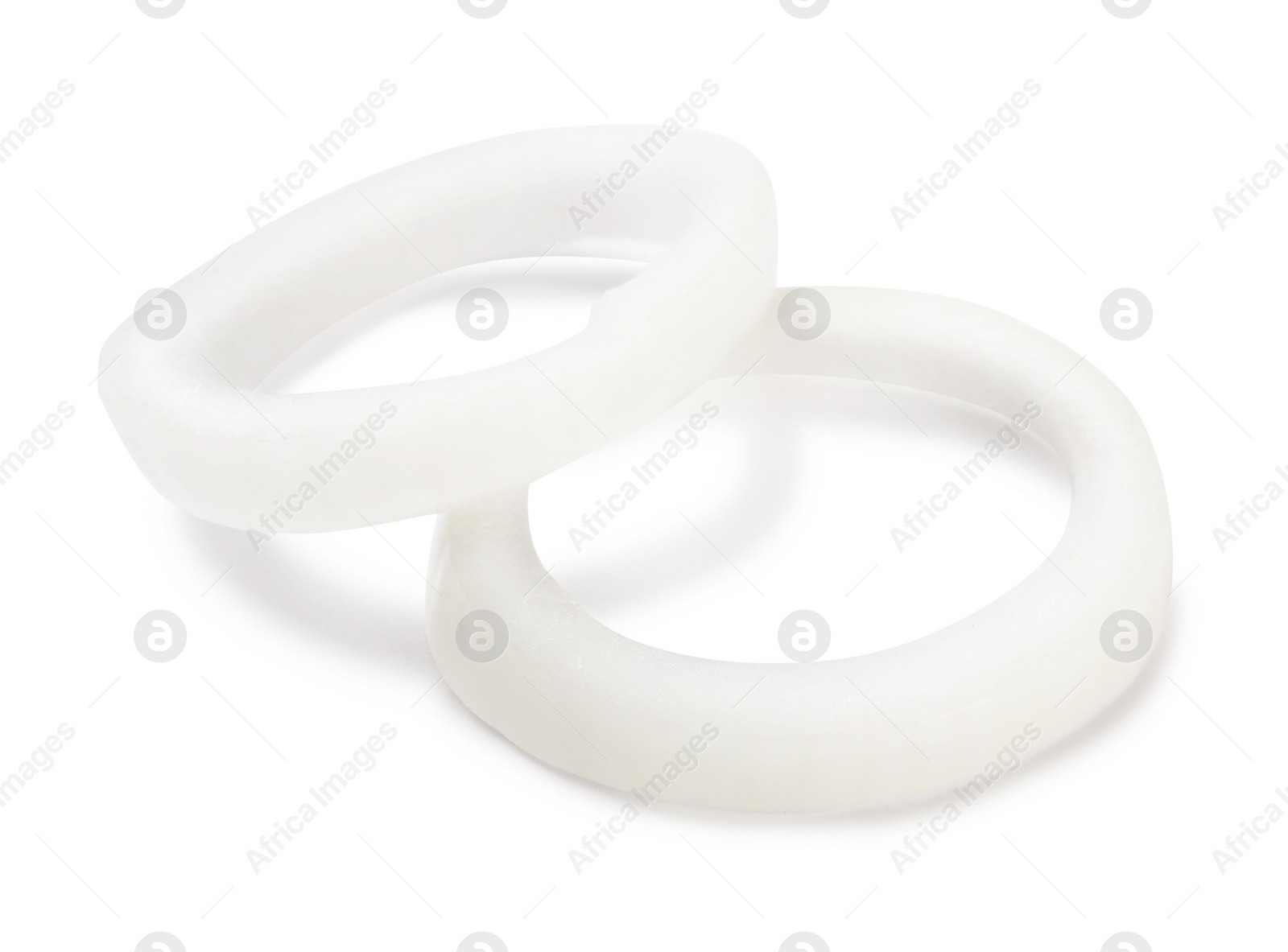 Photo of Fresh ripe onion rings on white background