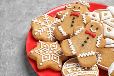 Photo of Tasty homemade Christmas cookies on grey table