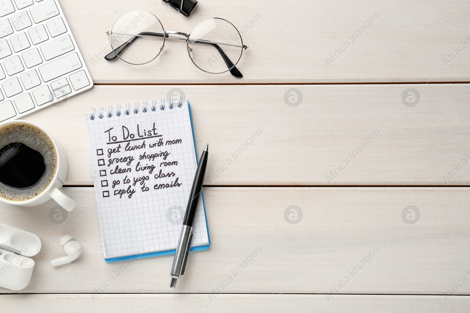 Photo of Flat lay composition with to do list on white wooden table, space for text