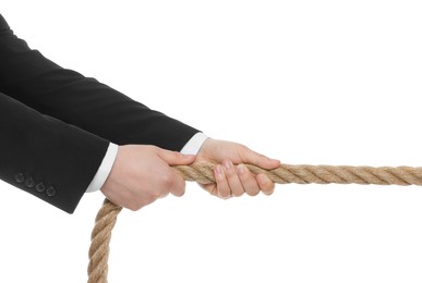 Photo of Dispute concept. Man pulling rope on white background, closeup