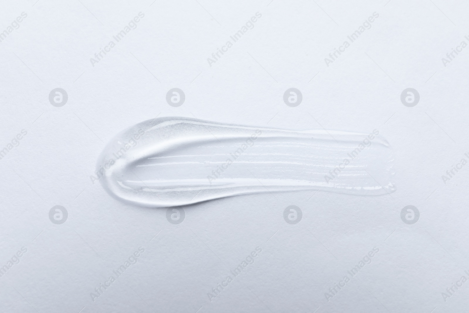 Photo of Swatch of cosmetic gel on white background, top view