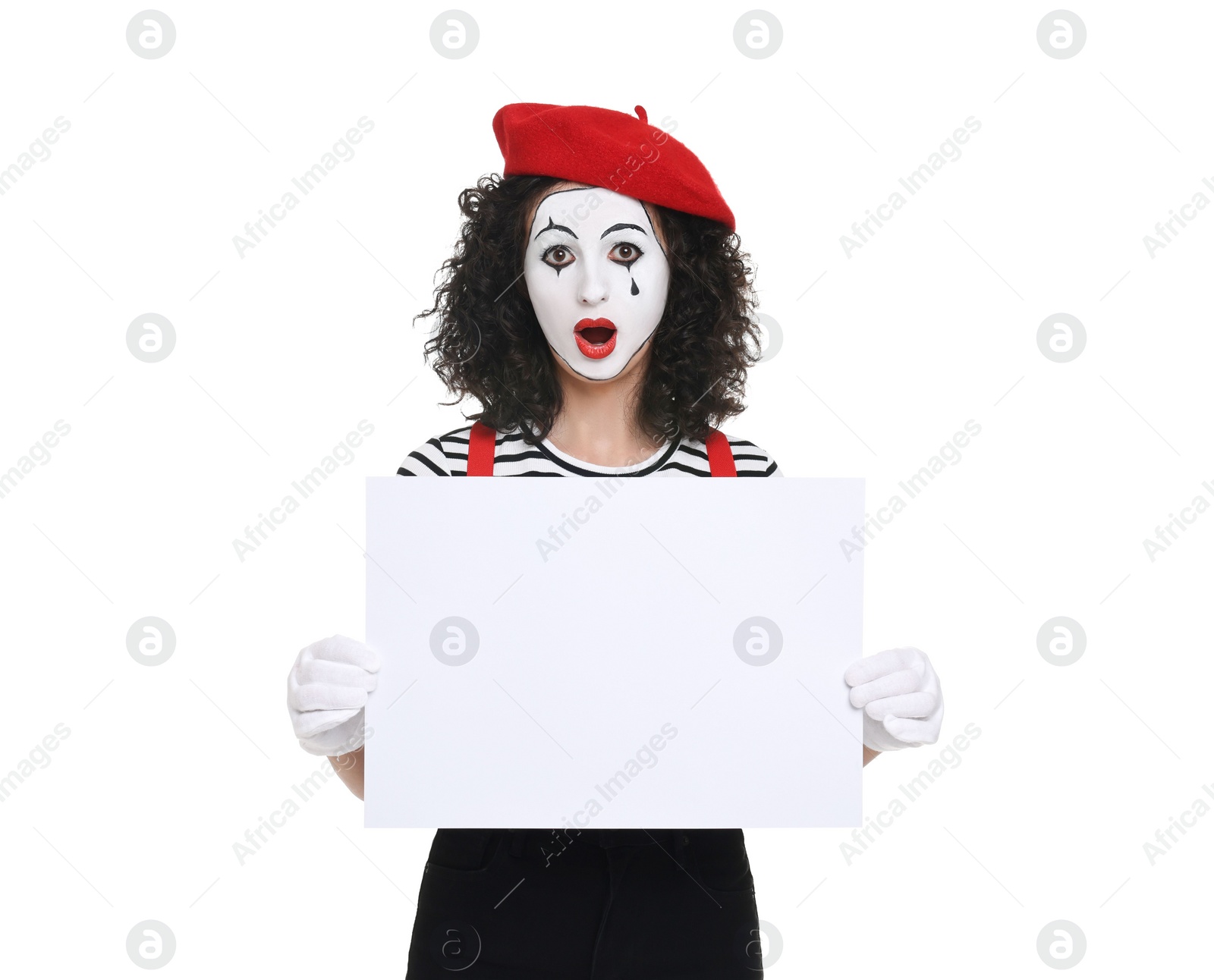 Photo of Funny mime with blank sign posing on white background