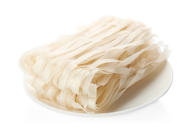 Photo of Plate with rice noodles isolated on white