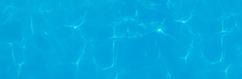 Swimming pool water as background, top view. Banner design