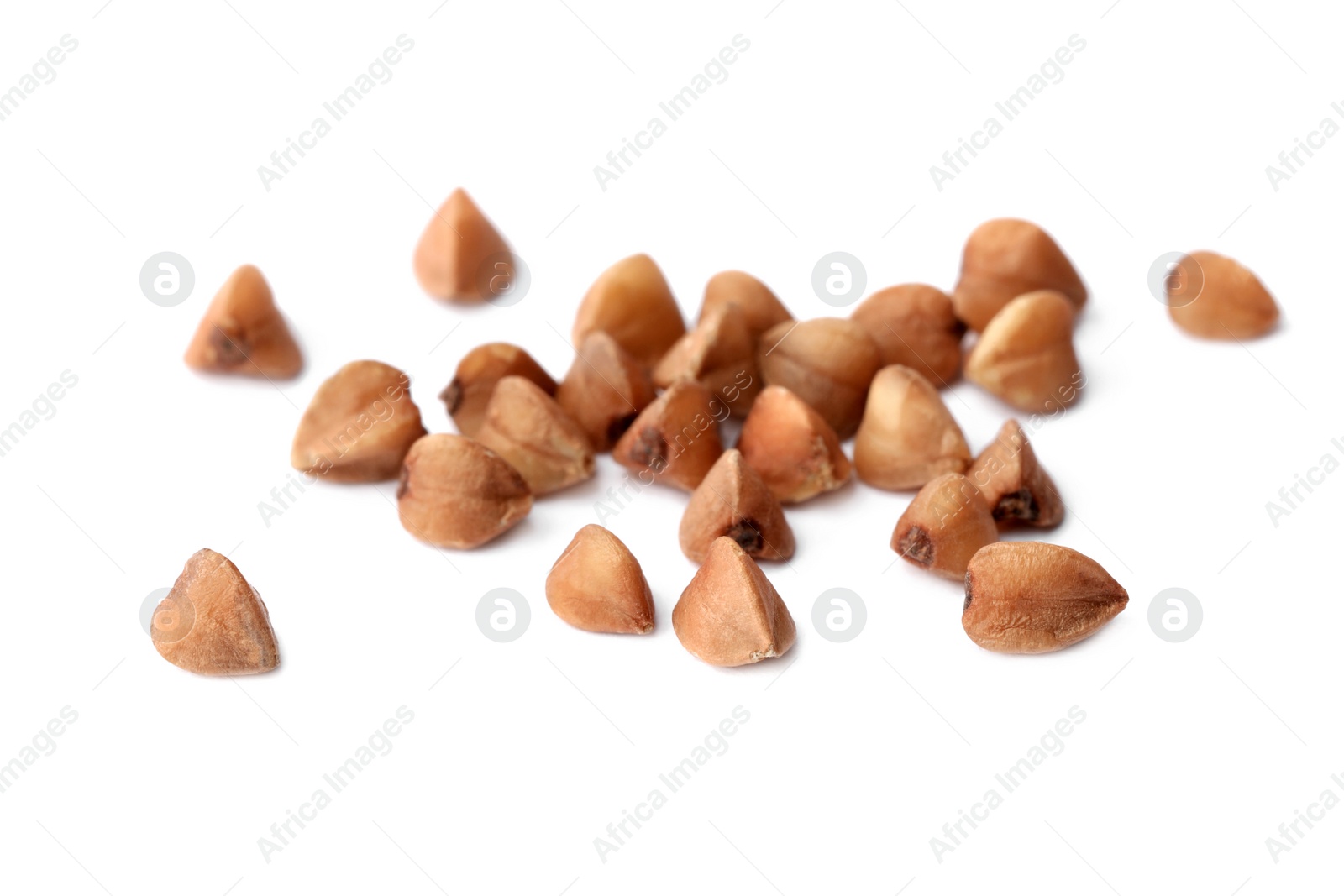 Photo of Buckwheat grains isolated on white. Organic cereal