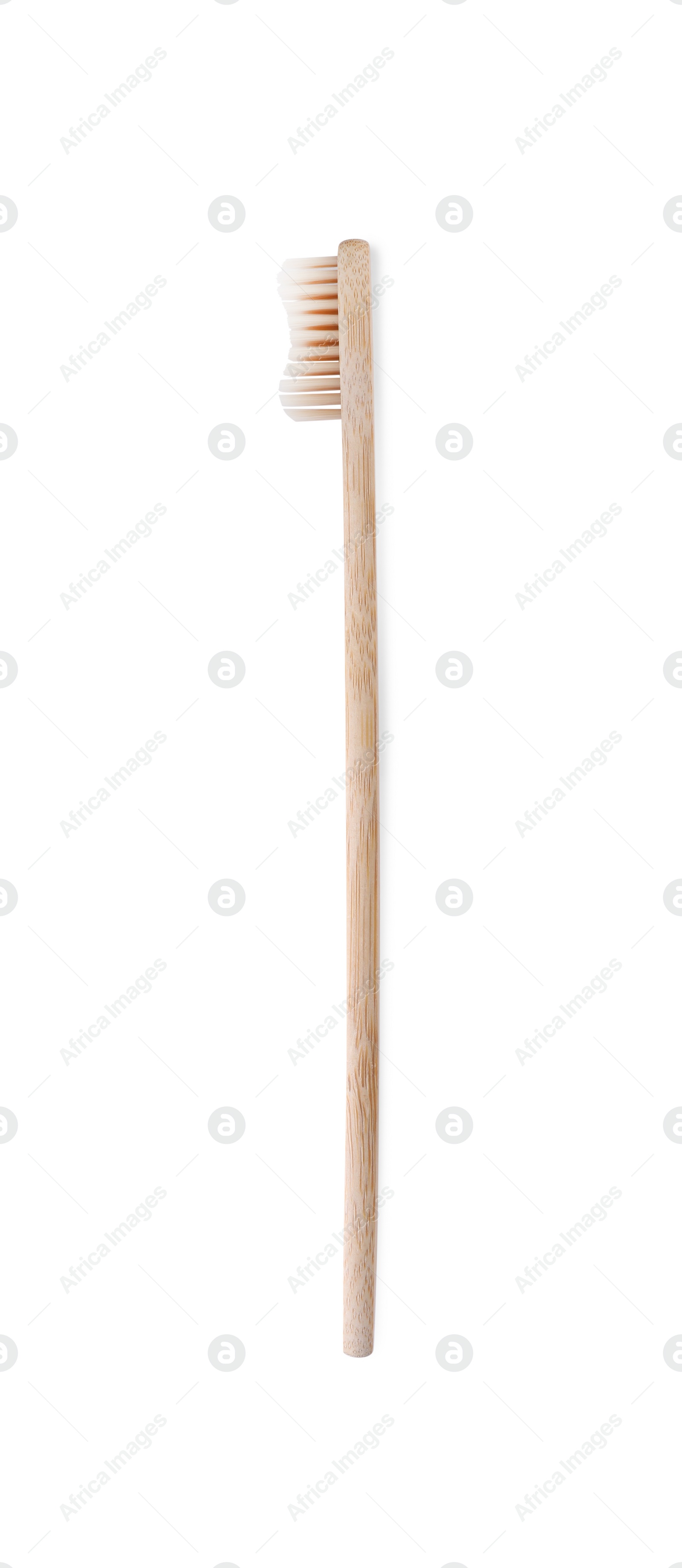 Photo of One bamboo toothbrush isolated on white, top view