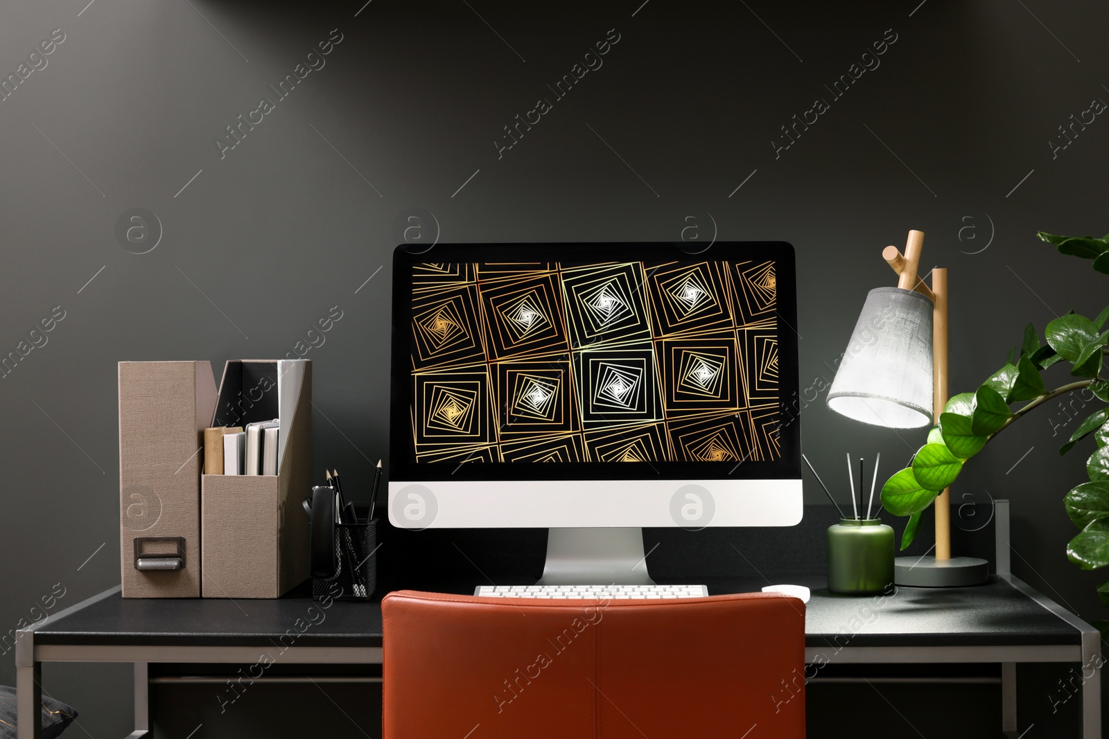 Photo of Cozy workspace with computer on metal desk at home