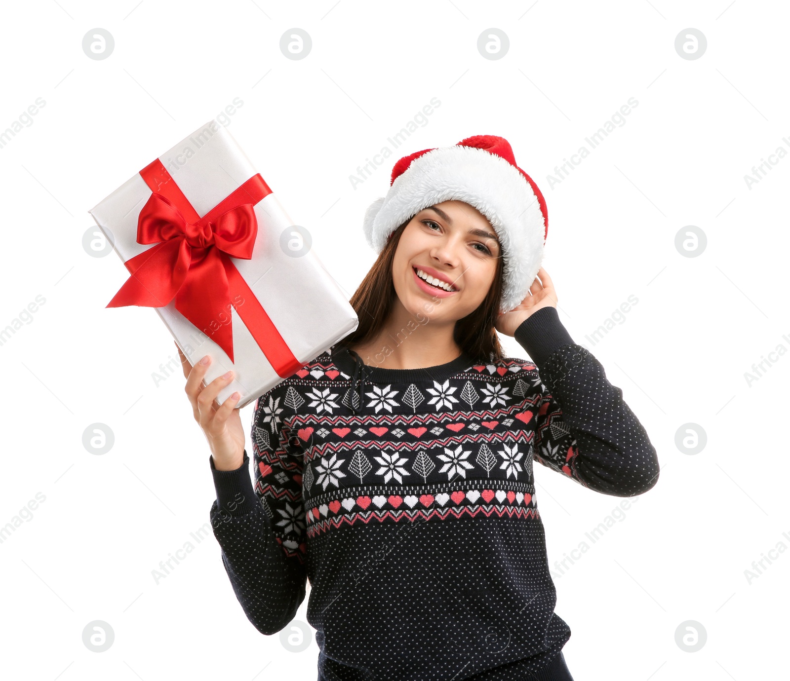 Photo of Young beautiful woman in Santa hat with gift box on white background. Christmas celebration