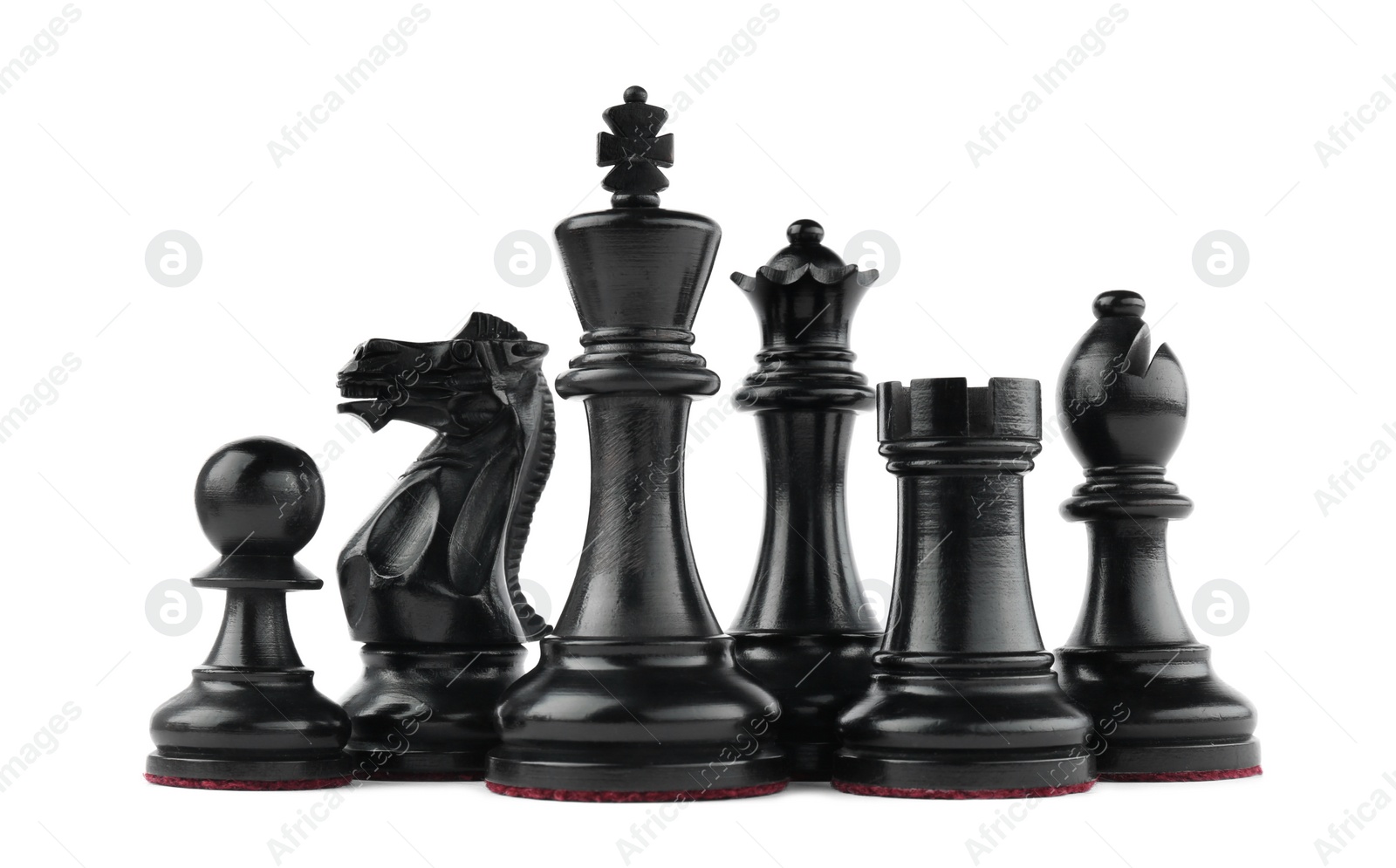 Photo of Set of black chess pieces on white background