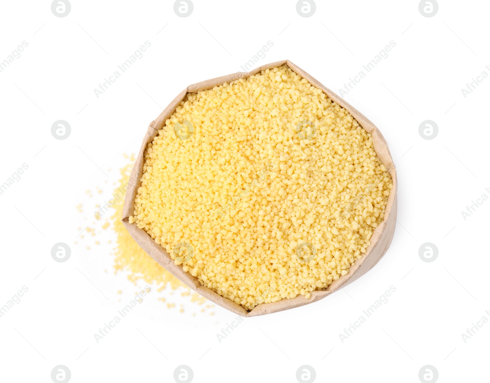 Photo of Raw couscous in paper bag isolated on white, top view