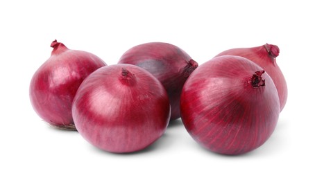 Many fresh red onions on white background