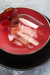 Clean plates, bowl and glass on table, closeup