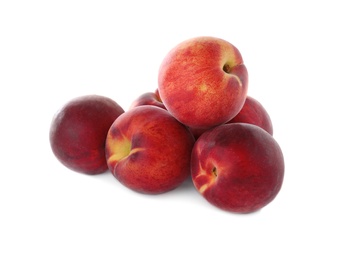 Photo of Delicious ripe sweet peaches isolated on white