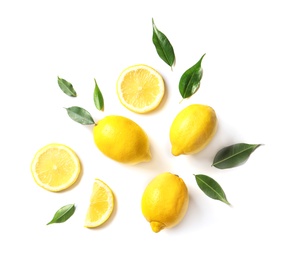 Flat lay composition with lemons and leaves on white background