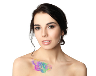 Image of Young woman with colorful tattoo of butterfly on her body against white background