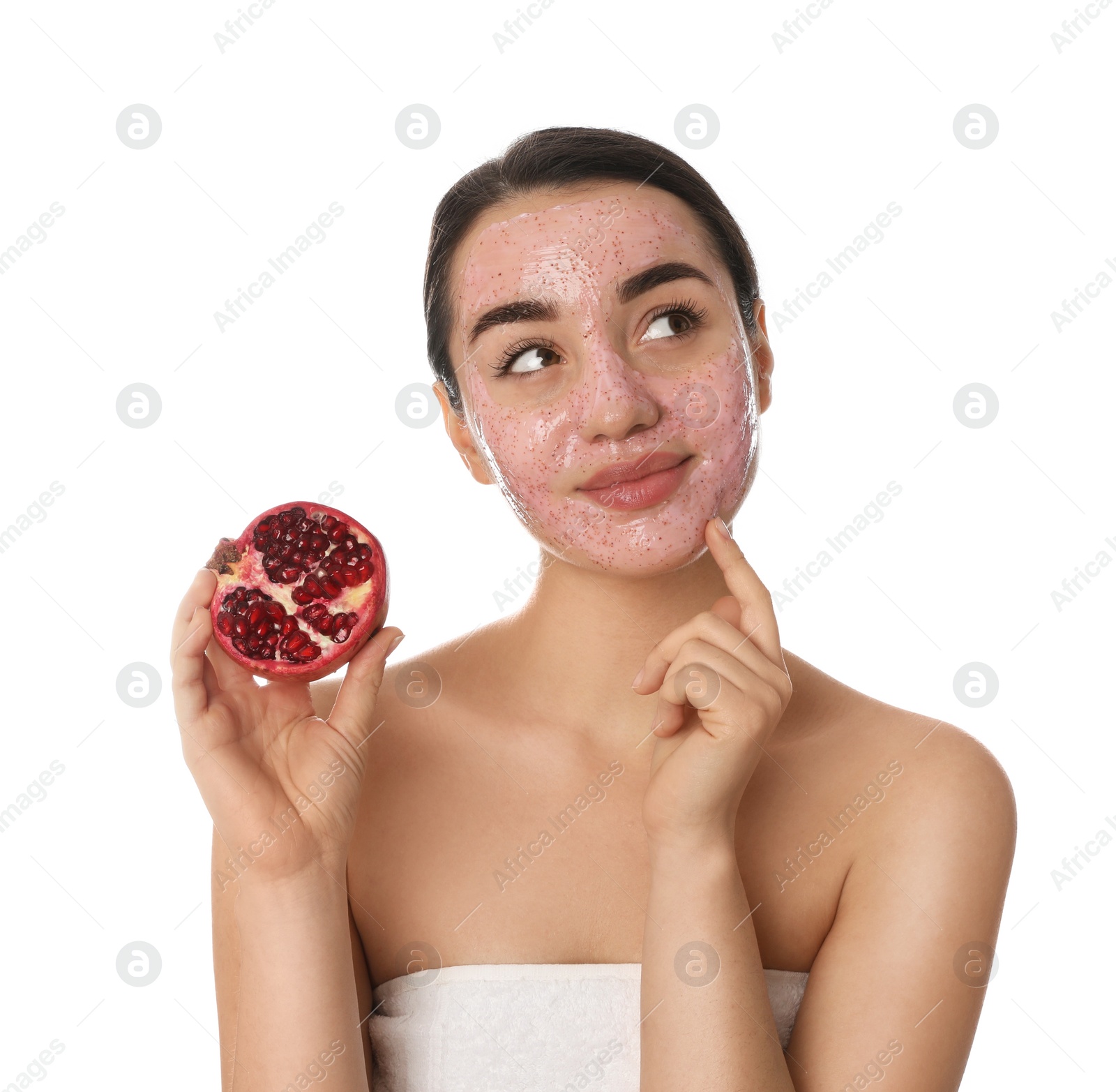 Photo of Woman with pomegranate face mask and fresh fruit on white background