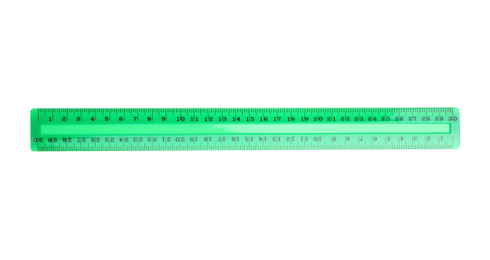 Photo of Colorful plastic ruler isolated on white, top view. School stationery