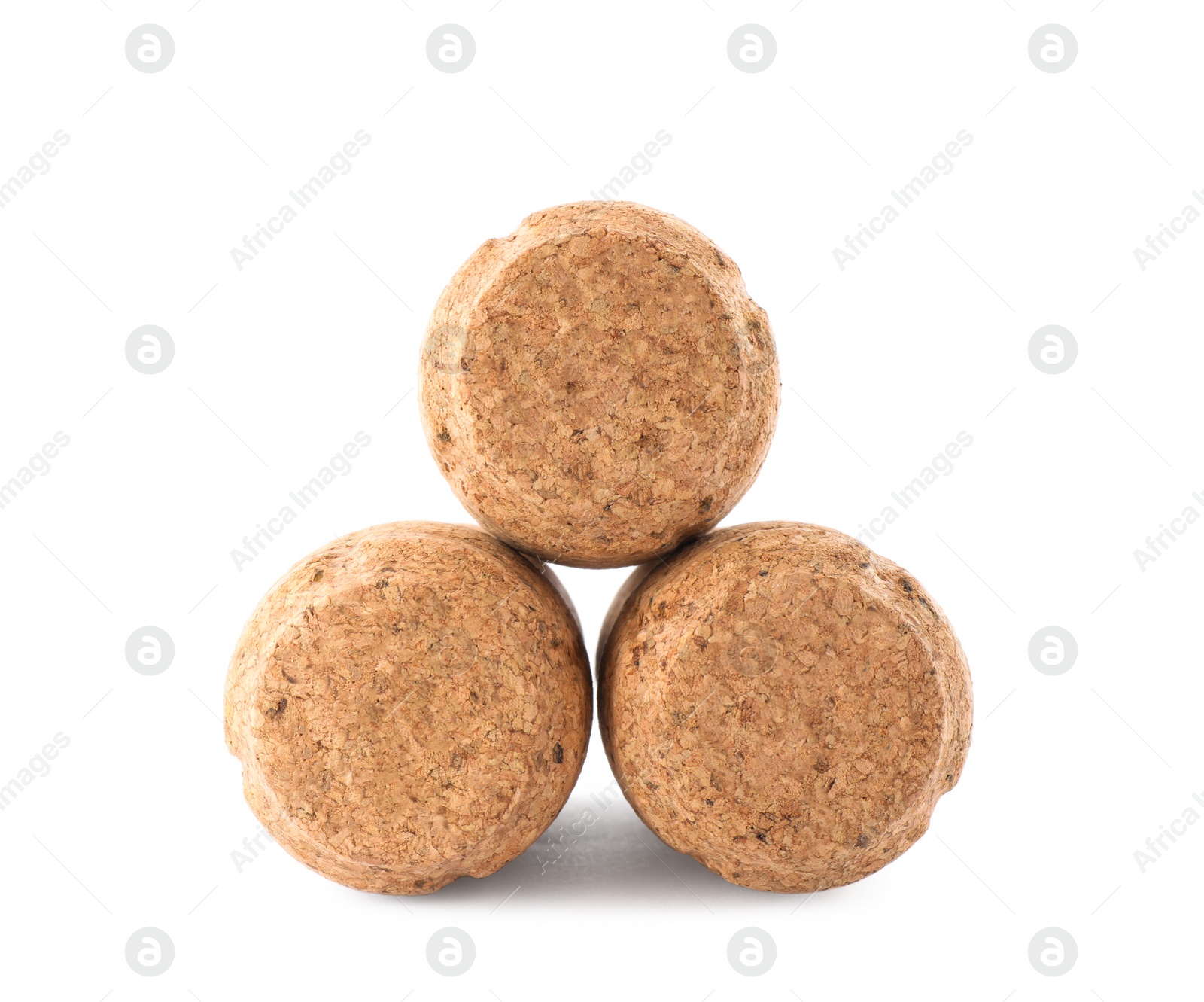 Photo of Many sparkling wine corks on white background