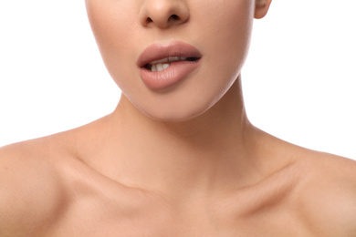 Woman with pink lipstick on white background, closeup