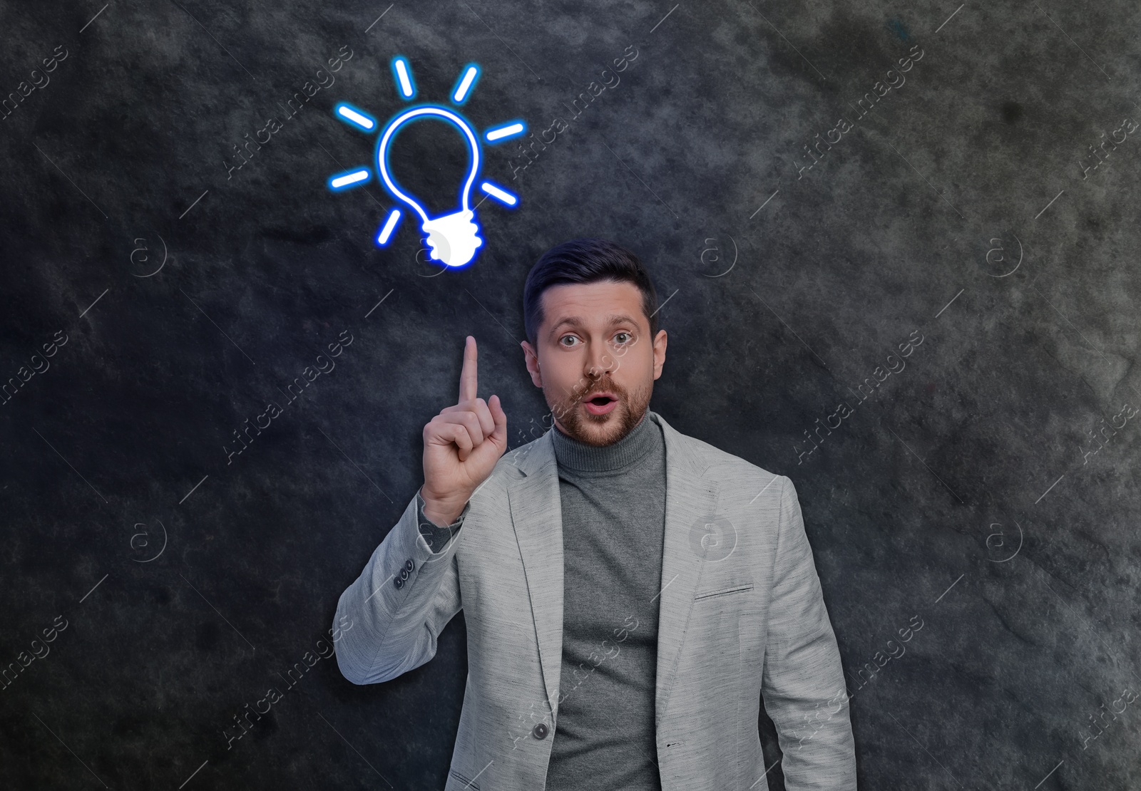 Image of Idea generation. Man and illustration of light bulb on grey background