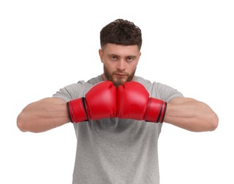 Man in boxing gloves on white background