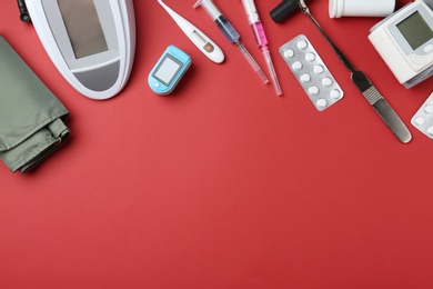 Photo of Flat lay composition with different medical objects and space for text on color background