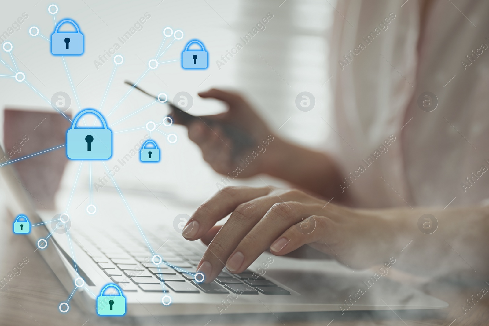 Image of Information security. Young woman using laptop at table indoors, closeup