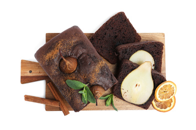 Photo of Tasty pear bread with mint, cinnamon and dried orange slices on white background, top view. Homemade cake