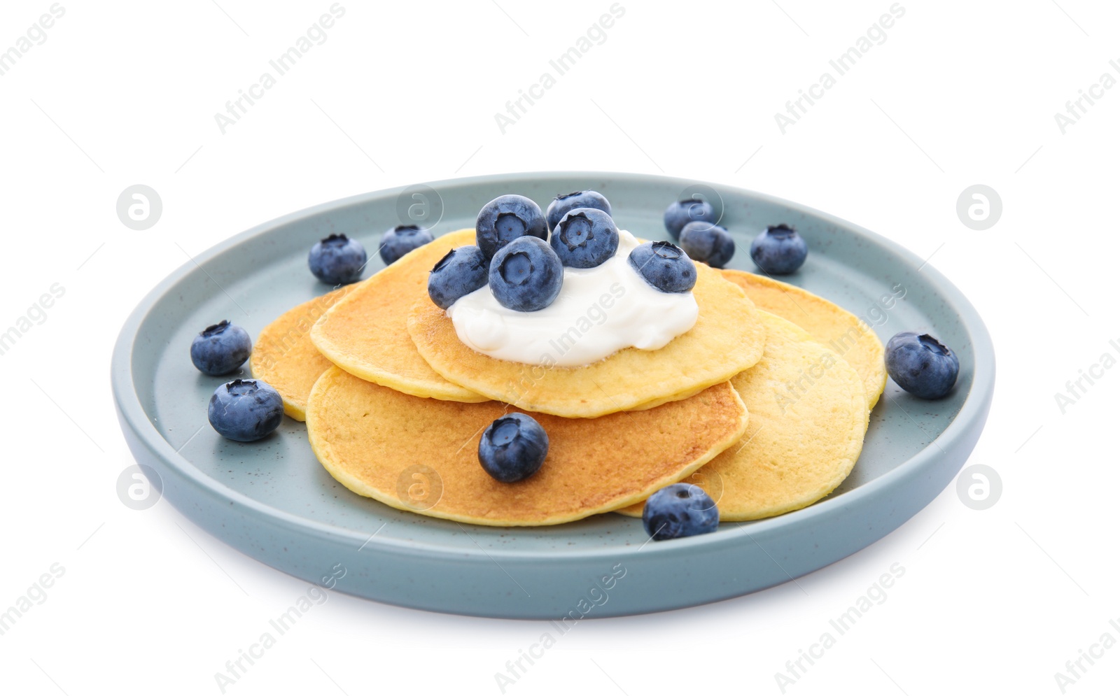 Photo of Tasty pancakes with natural yogurt and blueberries on white background