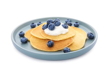Photo of Tasty pancakes with natural yogurt and blueberries on white background