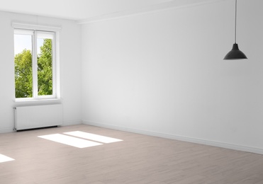 Photo of Empty living room with window. Interior design