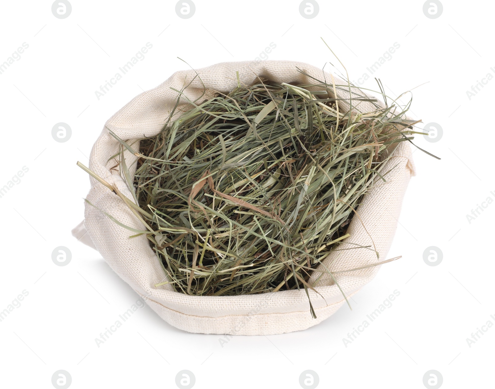 Photo of Dried hay in burlap sack isolated on white