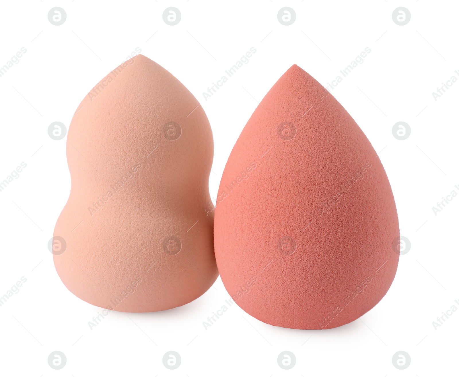 Photo of Two different make up sponges isolated on white