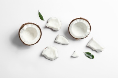 Composition with coconuts on white background, top view