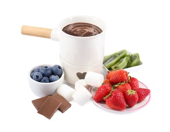 Photo of Fondue pot with melted chocolate, fresh berries, kiwi and marshmallows isolated on white