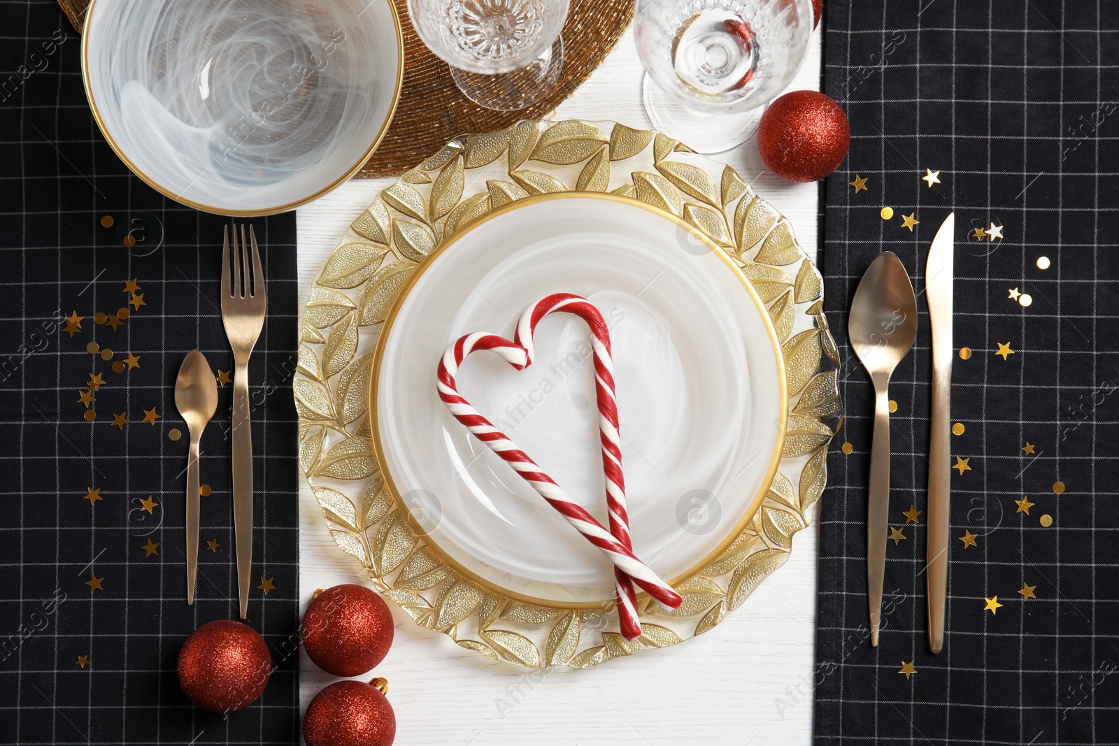 Photo of Elegant table setting on light background, top view. Christmas celebration